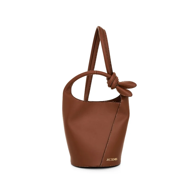 Best bucket bags with transparent materials for a bold and modern fashion trend-Le Petit Tourni Leather Bag in Light Brown 2