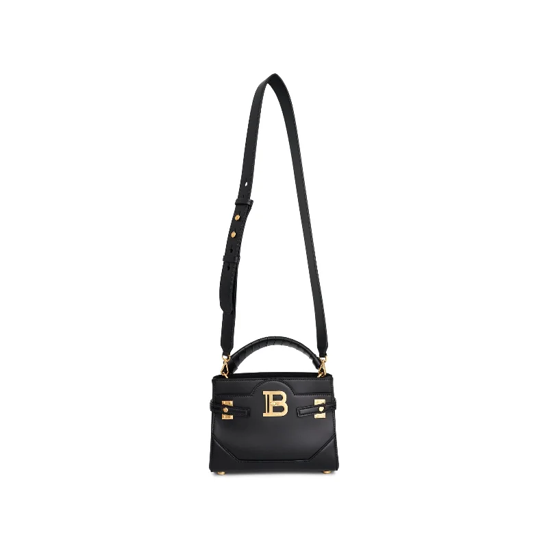 Best bucket bags for summer with straw materials for a beachy and casual vibe-B-Buzz Top Handle 22 Bag in Black