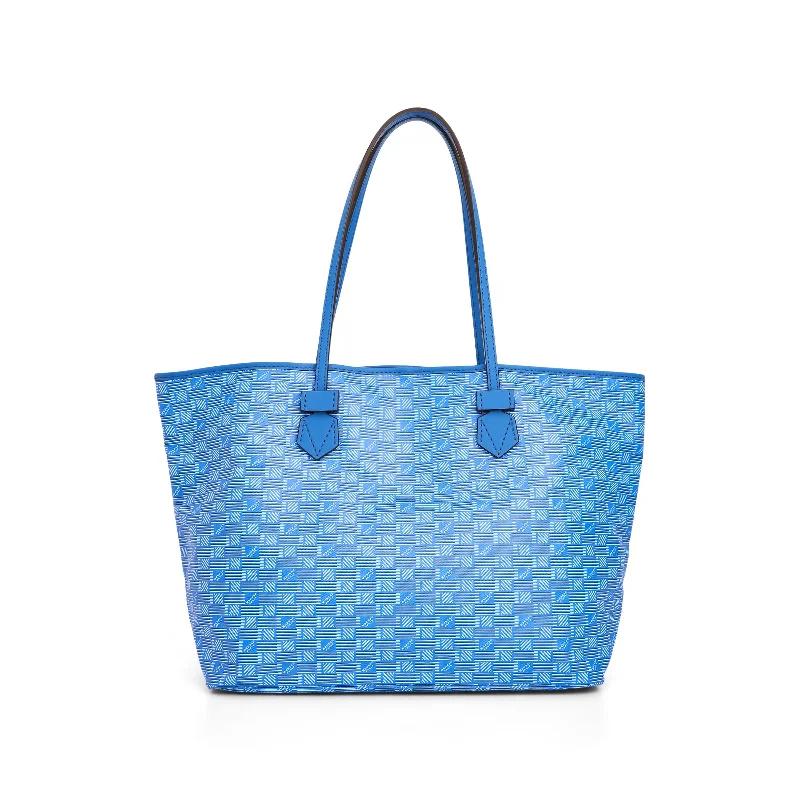 Best bucket bags with vibrant prints like animal or floral for a fun fashion statement-Saint Tropez Tote Bag LR in Blue