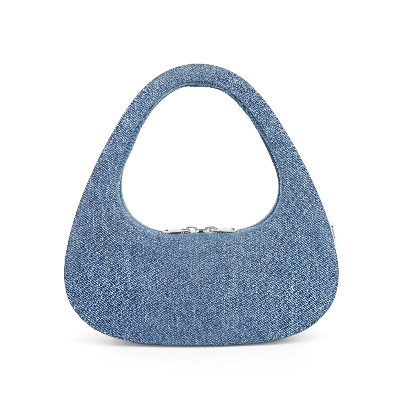 Bucket bags with multi-color designs for a bold and vibrant fashion statement-Denim Baguette Swipe Bag in Washed Blue