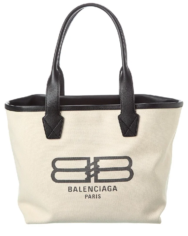 Handle bags with spacious interiors for storage -Balenciaga Jumbo Canvas & Leather Tote