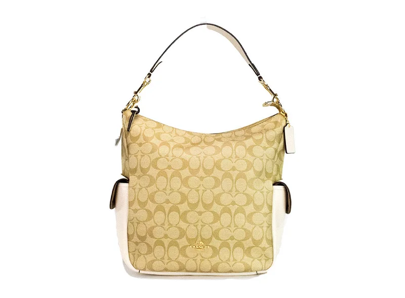 Handle bags with sleek silhouettes for fashion -Coach Pennie Light Khaki Chalk Signature Coated Canvas Handbag