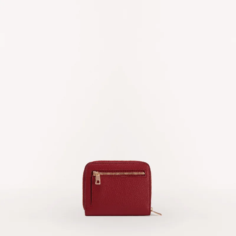 Handle bags with expandable sides for flexibility -Furla  Zip Around