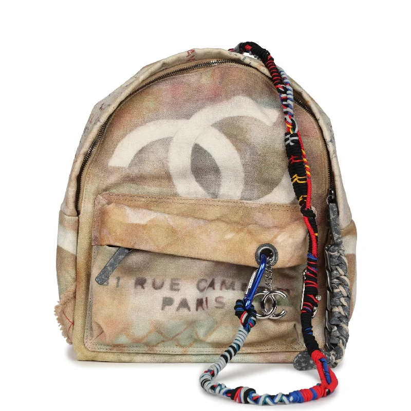 Retro canvas backpack with leather strap details -Pre-owned Chanel Graffiti Backpack Beige Multicolored Canvas Silver Hardware