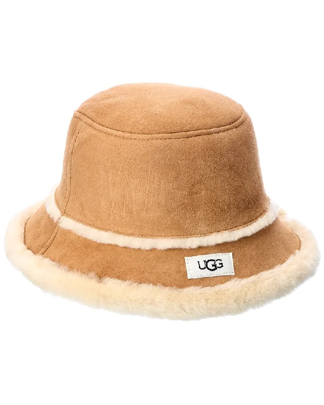 Handle bags with sleek hardware for sophistication -UGG Shearling Bucket Hat