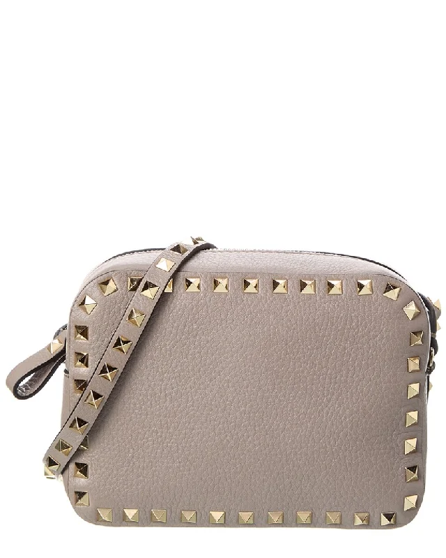 Handle bags with sturdy bases for stability -Valentino Rockstud Grainy Leather Camera Bag